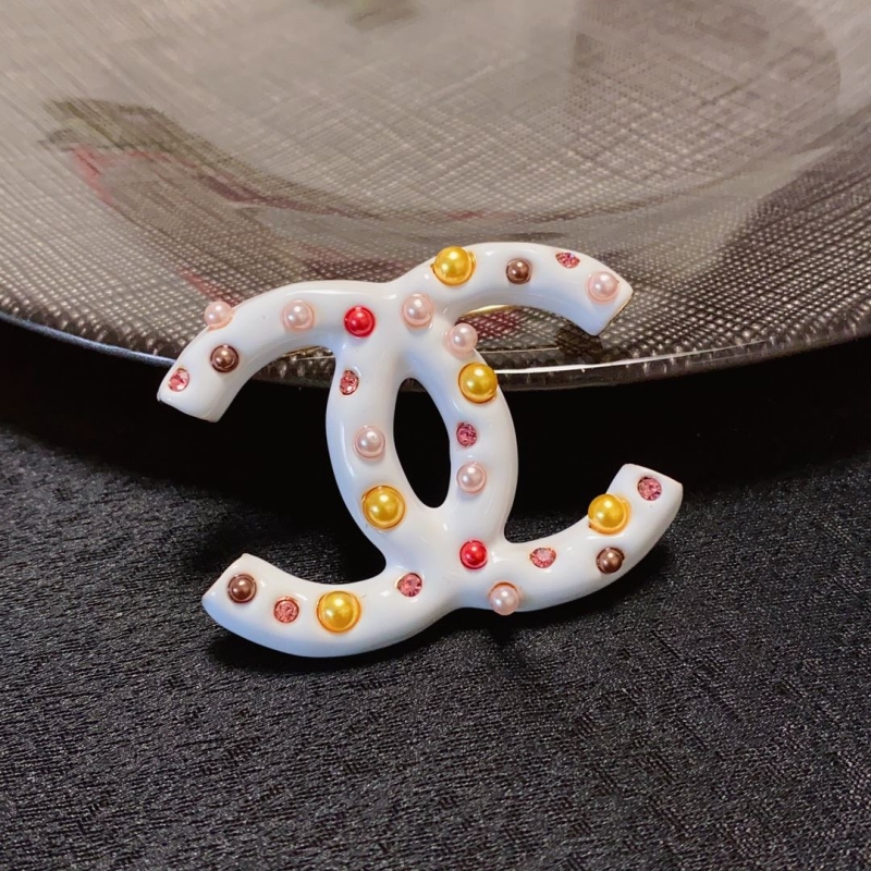 Ch**el brooches
